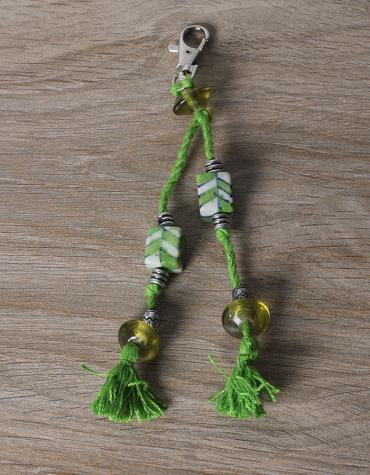JAIPUR BLUE POTTERY HANDMADE BEAD BAG CHARM IN GREEN WITH COTTON THREAD WORK