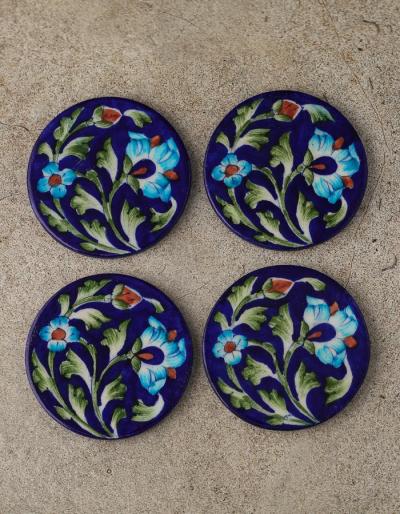 Turquoise Flower and leafy design on Blue Coaster